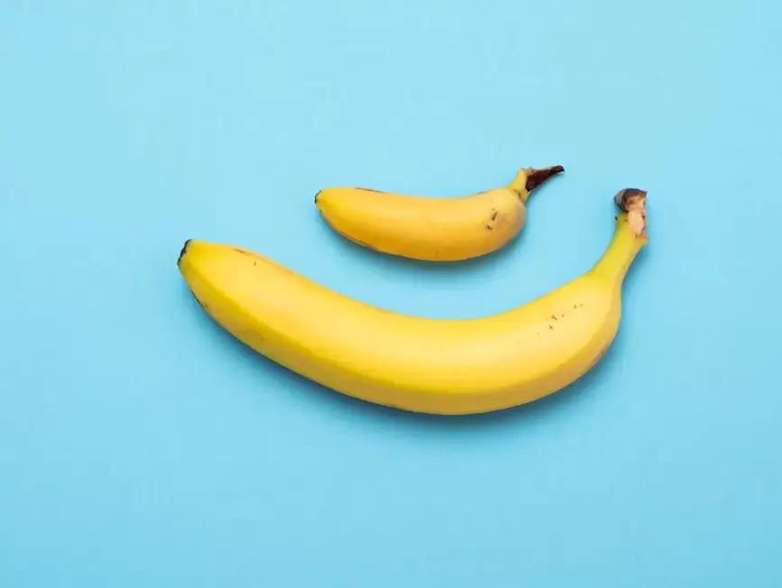 small and enlarged penis with pomp using the example of bananas